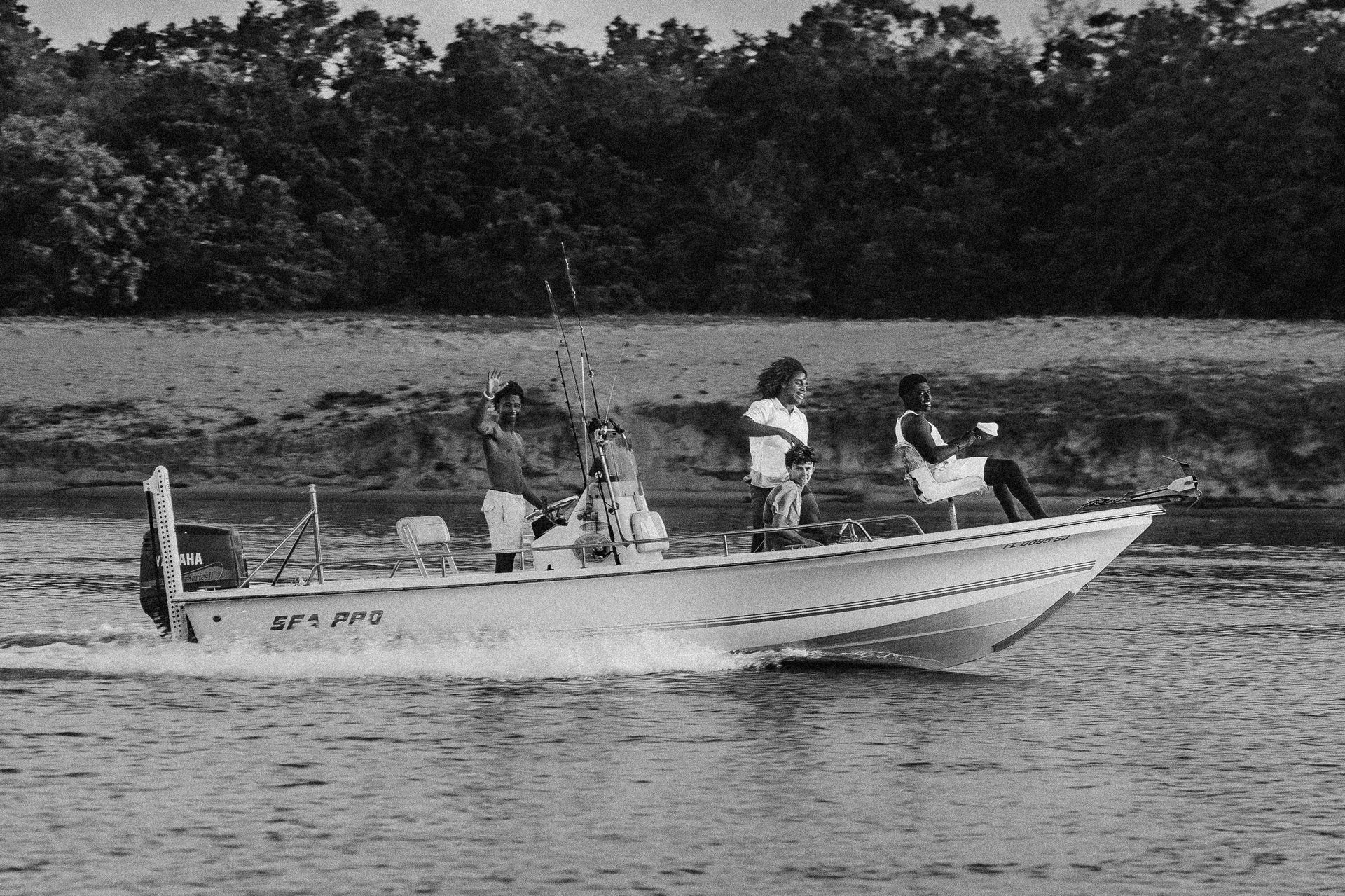 Friends fishing on Sea Pro boat