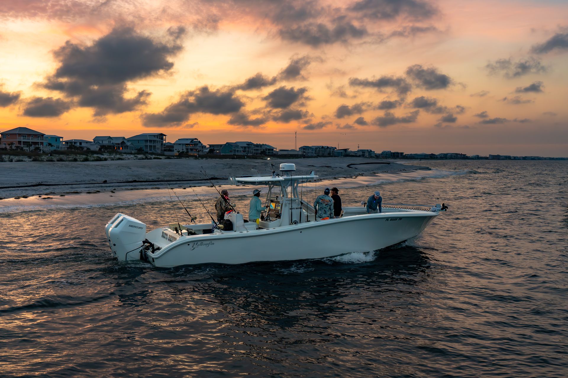 Fishing boat at sunset aerial view