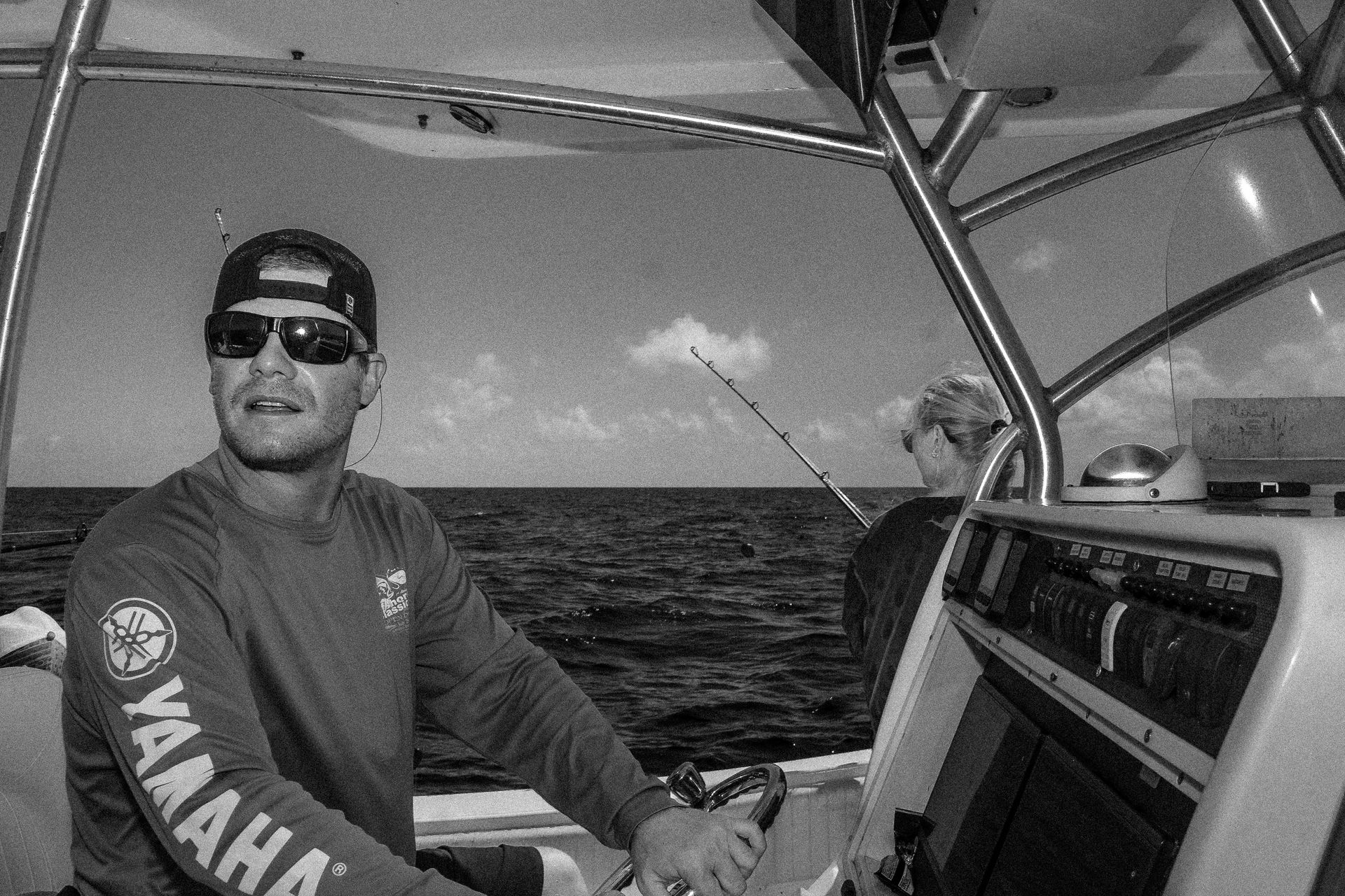 Captain at helm offshore fishing